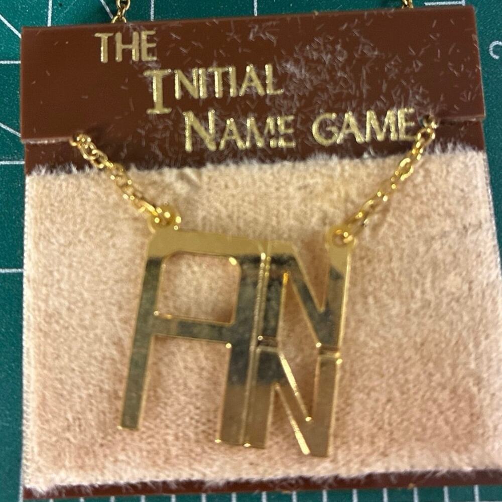 The Initial Name Game ANN vintage gold tone necklace